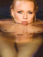 Irina Voronina caressing her body in the pool